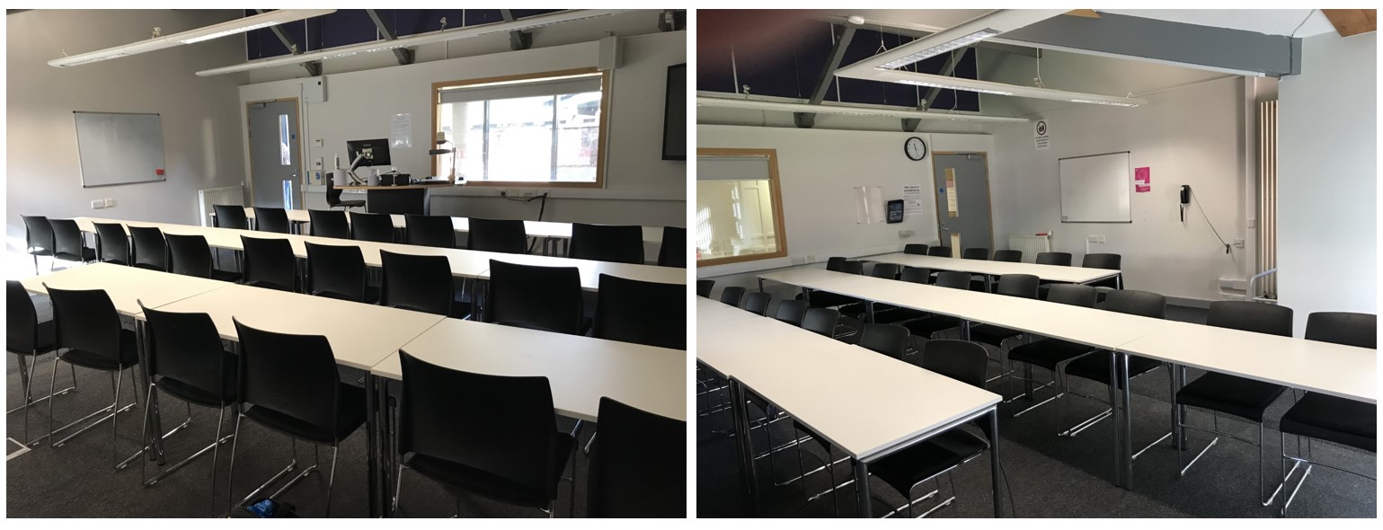 Rows of tables and chairs facing the teaching wall